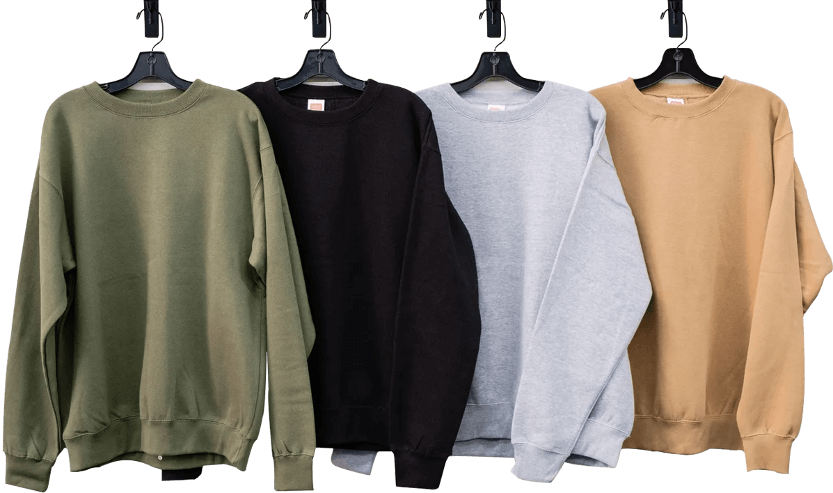 A group of four different colored sweatshirts hanging on clothes hangers.